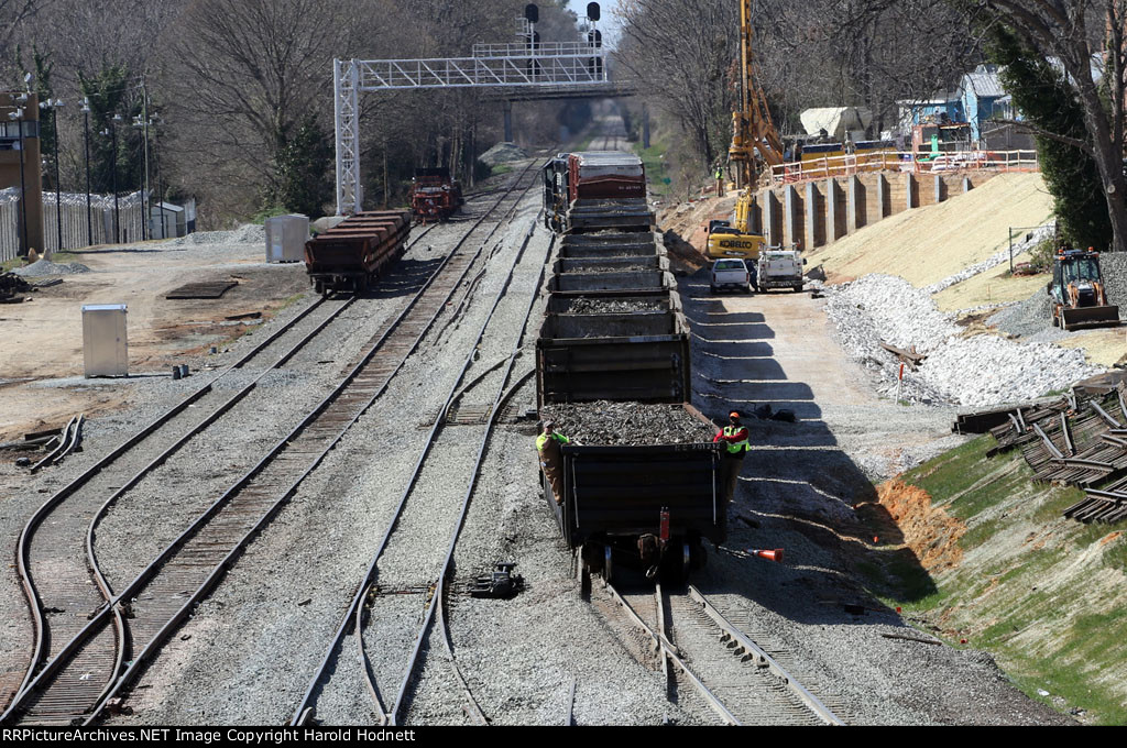 Train E60 is backing onto the new track approaching Boylan Junction